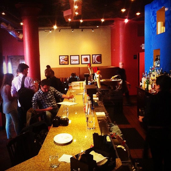 Photo taken at Saffron Restaurant &amp; Lounge by Jim R. on 5/22/2012