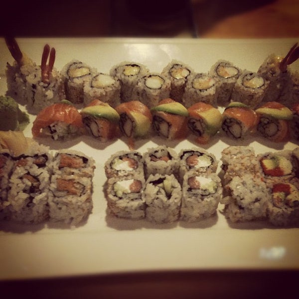 Photo taken at Murasaki Restaurant and Sushi Bar by Alyssa P. on 5/26/2012