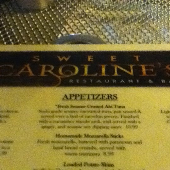 Photo prise au Sweet Caroline&#39;s Restaurant &amp; Bar par Line H. le7/31/2012