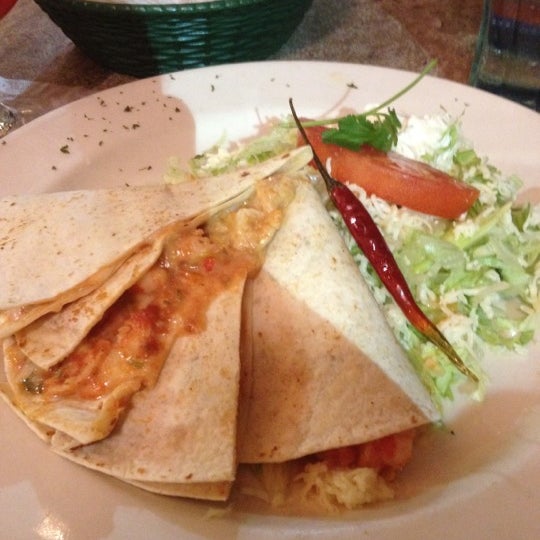 Foto tomada en La Parrilla Mexican Restaurant  por Stacy el 9/1/2012
