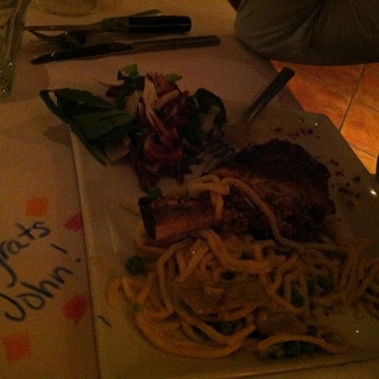 Photo taken at Romano&#39;s Macaroni Grill by Mallory H. on 5/9/2012