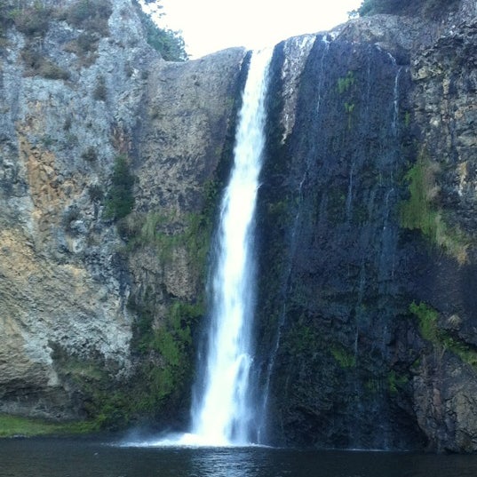 Photo taken at Hunua Falls by Ping X. on 4/8/2012