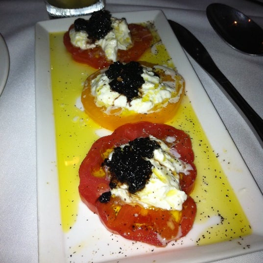 Photo taken at Ruffino&#39;s Restaurant - Steak, Seafood, Italian by Katie P. on 8/19/2012