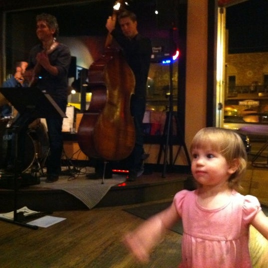 Photo taken at Rico&#39;s Cafe &amp; Wine Bar by Russ W. on 3/25/2012