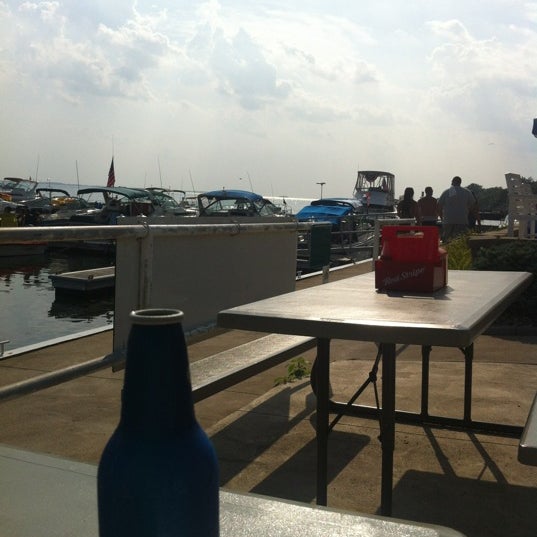 Photo taken at Dockers Waterfront Restaurant &amp; Bar by Nikki L. on 7/4/2012