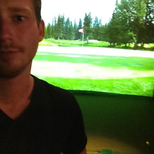 Photo taken at The Range Golf Center &amp; Sports Bar by Chris A. on 8/22/2012