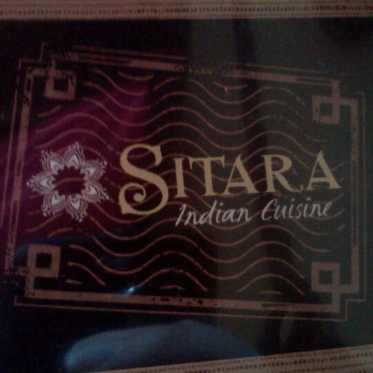 Photo taken at Sitara Indian Restaurant by Michael I. on 5/23/2012