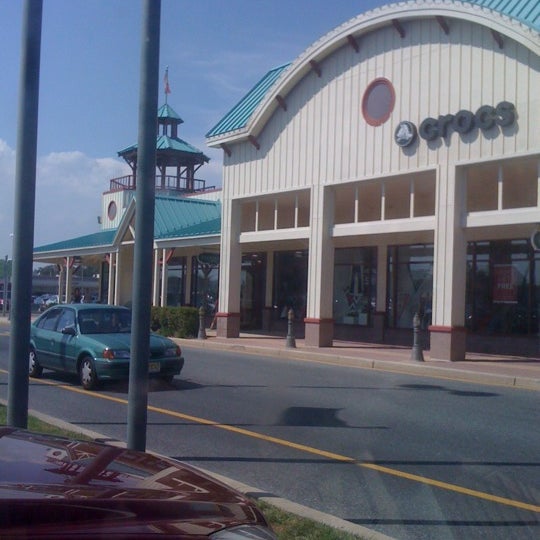 Photo taken at Tanger Outlets Rehoboth Beach by Joe B. on 8/4/2012