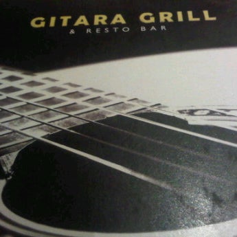 Photo taken at Gitara Grill by Les V. on 4/23/2012