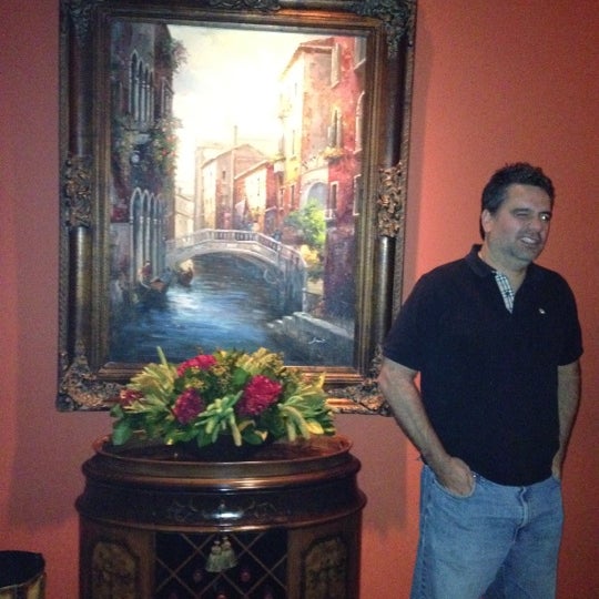 Photo taken at Caruso&#39;s Fine Italian Dining by Jennifer S. on 4/29/2012