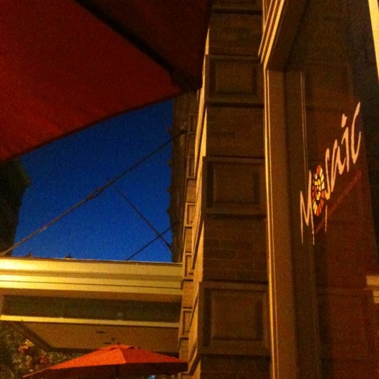 Photo taken at Mosaic Restaurant &amp; Lounge by Trisha L. on 5/10/2012