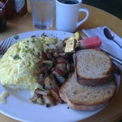 Photo taken at Wild Wheat Bakery Cafe &amp; Restaurant by Can S. on 7/11/2012