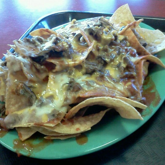 Photo taken at Los Sanchez Restaurant by Tracy E. on 8/1/2012