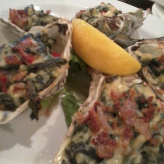 Photo taken at Doc Magrogan&#39;s Oyster House by Becky L. on 5/11/2012