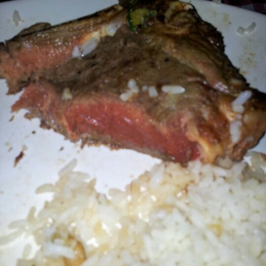 Photo taken at TBone Restaurante Steak Bar by Carlos Roberto J. on 6/21/2012