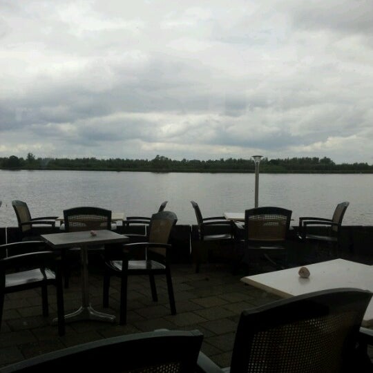Photo taken at Het Panorama Restaurant/Grand-Café by Jacqueline B. on 6/13/2012