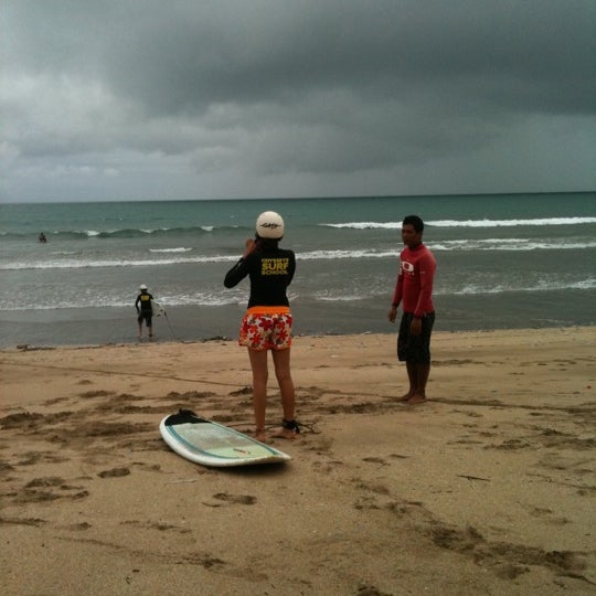 Photo taken at Odysseys Surf School by Yuki P. on 2/9/2012