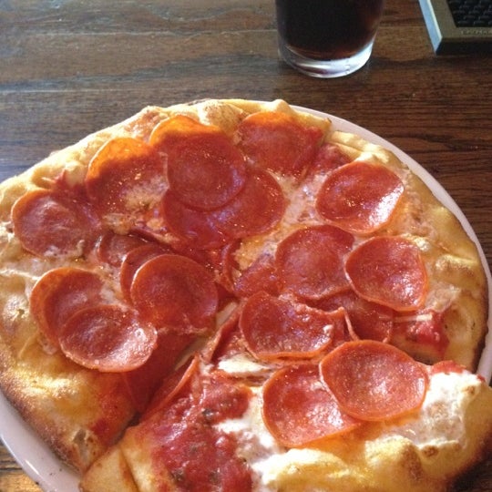 Photo taken at Goodfella&#39;s Woodfired Pizza Pasta Bar by Mike R. on 6/19/2012
