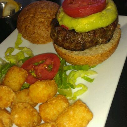 Photo taken at The Burger Bistro by fuDdy P. on 5/25/2012