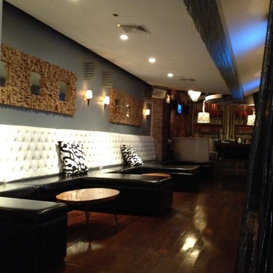 Photo taken at District Restaurant &amp; Lounge by Coop C. on 5/4/2012