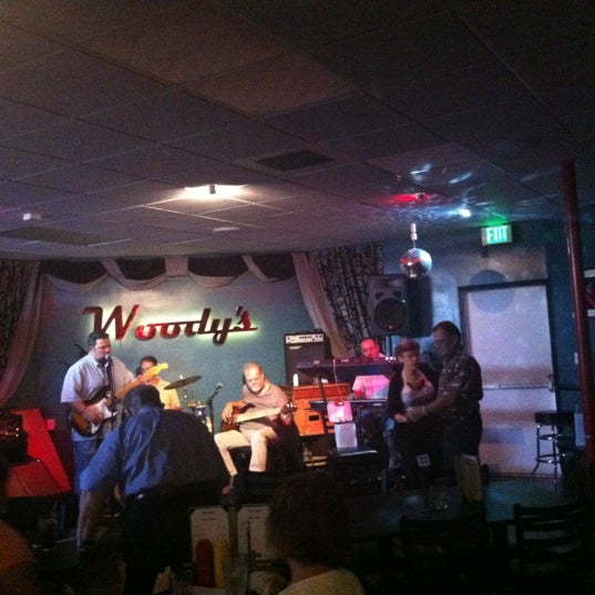 Photo taken at Woody&#39;s Burgers &amp; Beer by Brian L. on 8/6/2012