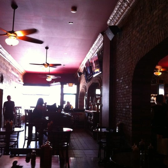 Photo taken at Red Rock Downtown Barbecue by Jonathan K. on 6/14/2012