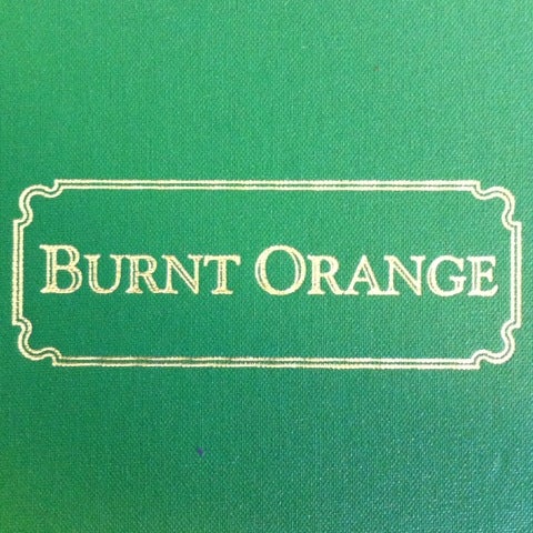 Photo taken at Burnt Orange Café by Alison T. on 2/18/2012