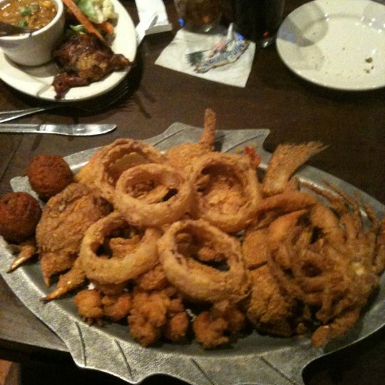 Photo taken at Mike Anderson&#39;s Seafood by Allen M. on 9/6/2012
