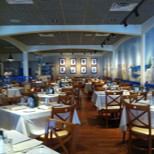 Photo taken at Pegasus Restaurant and Taverna by Christina S. on 8/25/2012