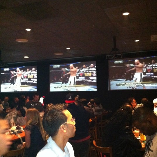 Photo taken at Lucky&#39;s Sports Theatre &amp; Grill by Sam F. on 4/22/2012