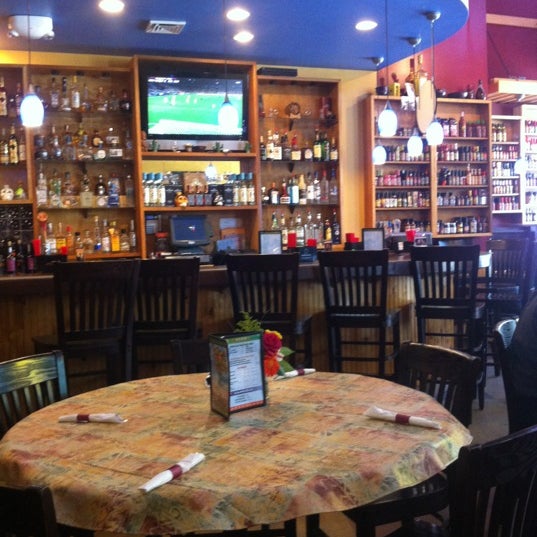 Photo taken at Tios Restaurant by Allan B. on 6/15/2012