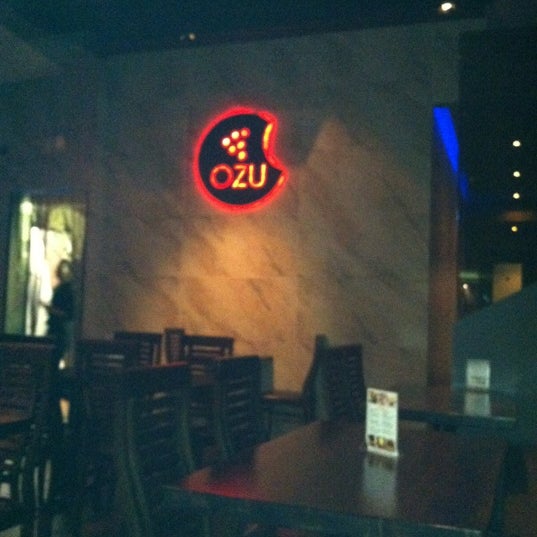 Photo taken at Ozu Japanese Cuisine &amp; Lounge by Jen L. on 4/15/2012