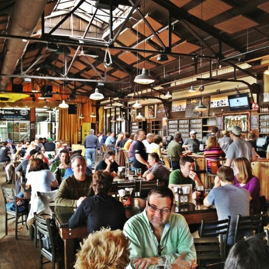 Photo taken at Founders Brewing Company Store by Todd G. on 3/24/2012