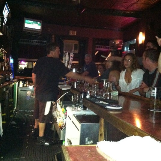 Photo taken at S. Sullivans Bar &amp; Grill by Edward B. on 8/18/2012