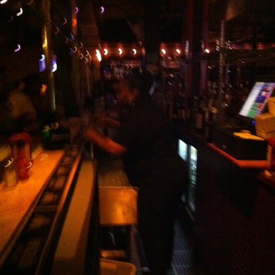 Photo taken at Flood&#39;s Bar &amp; Grille by Jessica S. on 7/8/2012