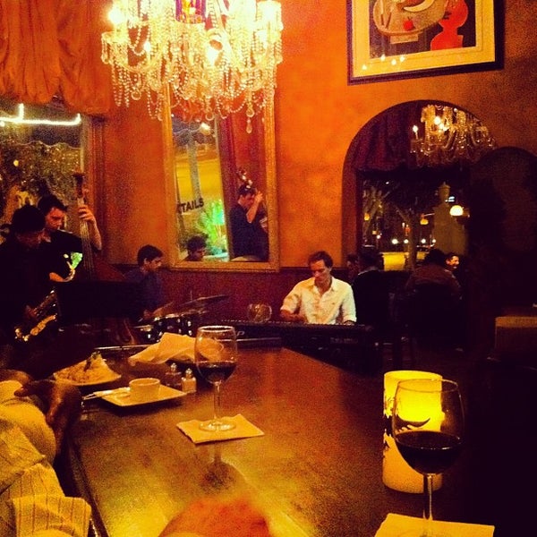 Photo taken at La Traviata Restaurant Bar and Lounge by Brandon Y. on 3/3/2012
