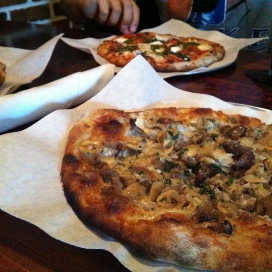 Photo taken at Hearth Pizza Tavern by Ryan B. on 7/22/2012