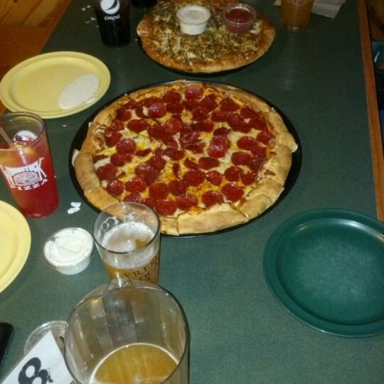 Photo taken at Woodstock&#39;s Pizza by David J. F. on 6/3/2012