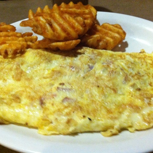 Photo taken at Steak Out: the breakfast and lunch place by Mike M. on 7/1/2012