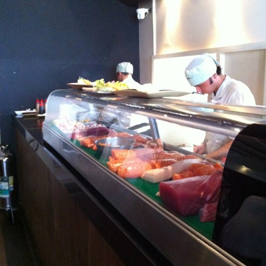 Photo taken at Sushibol by Andre O. on 4/14/2012