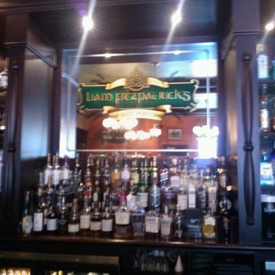 Photo taken at Liam Fitzpatrick&#39;s Restaurant &amp; Irish Pub by Brad P. on 7/12/2012