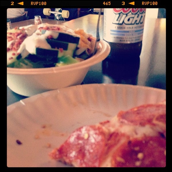 Photo taken at 4th St. Pizza Co. by Sergio P. on 4/4/2012