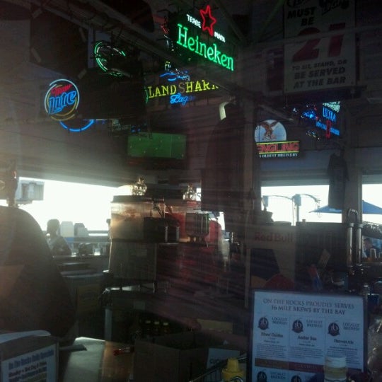 Photo taken at On The Rocks Bar and Grill by Bill D. on 6/24/2012