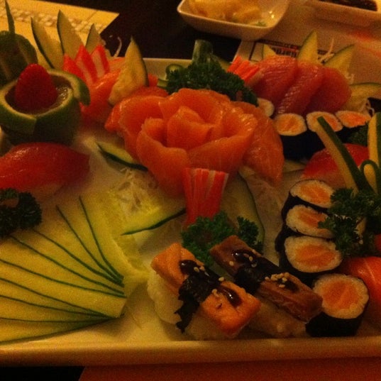 Photo taken at Sushi Garden by Katlyn S. on 6/15/2012