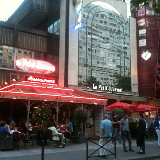 Photo taken at Le Petit Journal Montparnasse by Marc P. on 5/25/2012