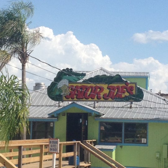 Photo taken at Gator Joe&#39;s Beach Bar &amp; Grill by Stephanie H. on 6/12/2012