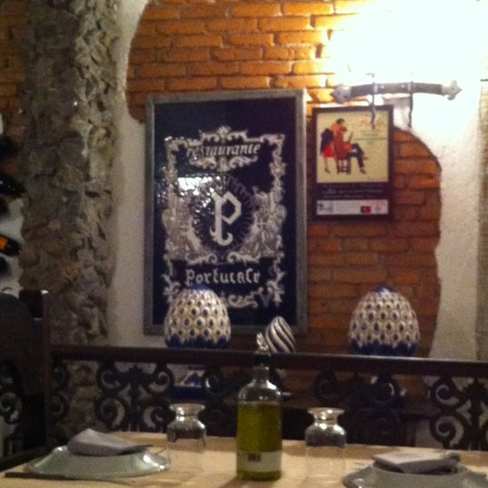 Photo taken at Portucale Cozinha Portuguesa by Elen C. on 3/30/2012