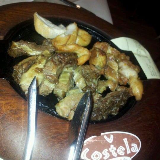Photo taken at Costela Premium Ribs by Edna A. on 3/8/2012