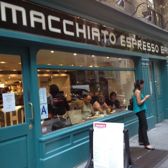 Photo taken at Macchiato Espresso Bar by Tiffany C. on 6/15/2012