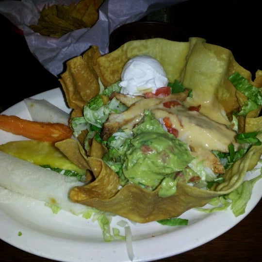 Photo taken at La Familia Mexican Restaurant by JULIE T. on 8/8/2012